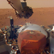 The Martian surface, as imaged by the Instrument Deployment Camera attached to InSight’s robotic arm.